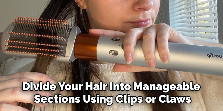 Divide Your Hair Into Manageable
Sections Using Clips or Claws