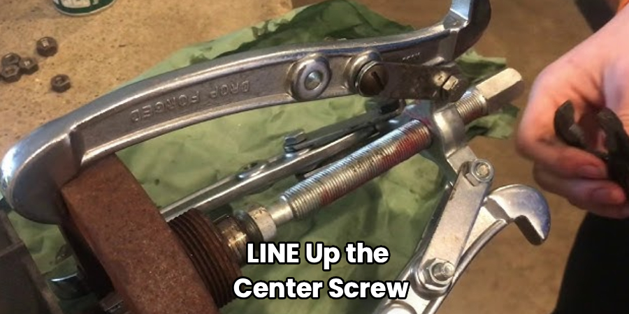LINE Up the
Center Screw