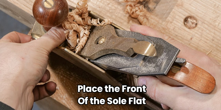 Place the Front
Of the Sole Flat