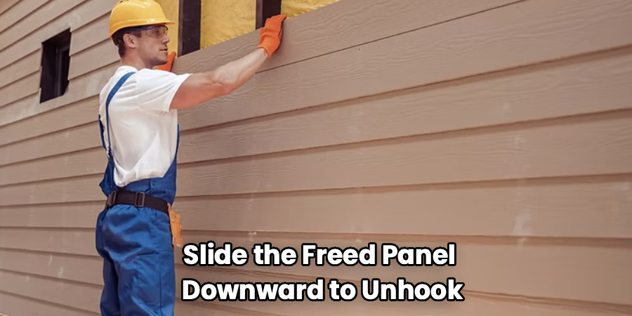 Slide the Freed Panel
Downward to Unhook