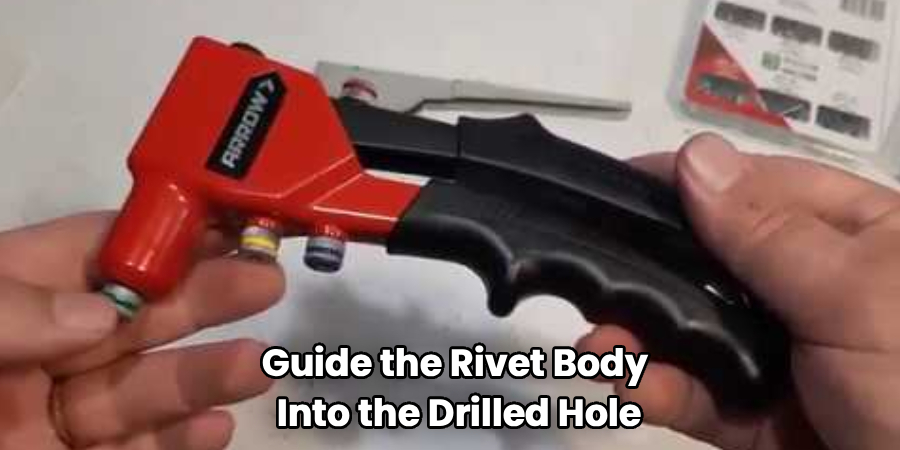 Guide the Rivet Body
Into the Drilled Hole