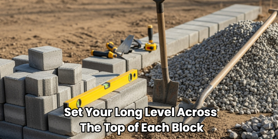 Set Your Long Level Across 
The Top of Each Block