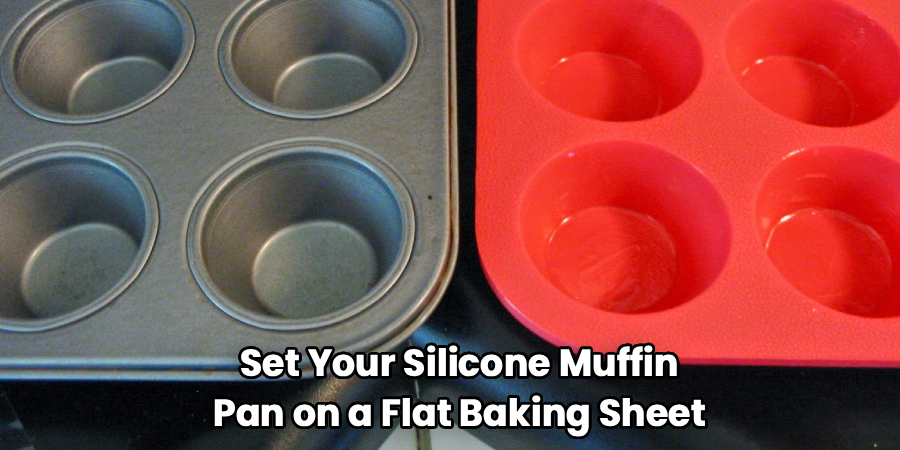 Set Your Silicone Muffin
Pan on a Flat Baking Sheet