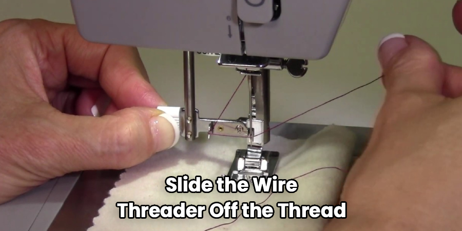 Slide the Wire
Threader Off the Thread