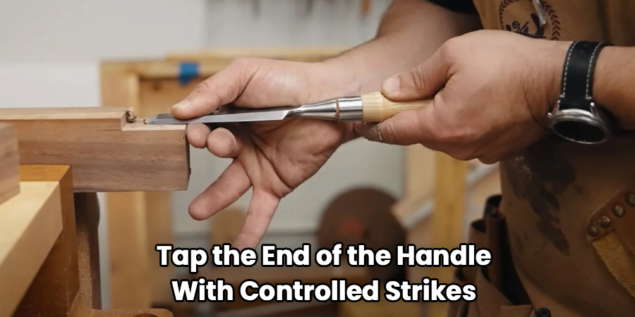 Tap the End of the Handle
With Controlled Strikes