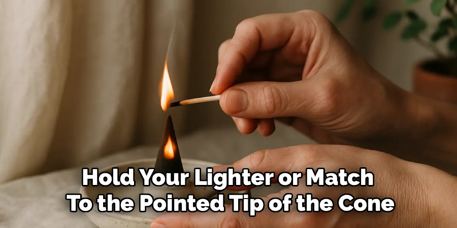 Hold Your Lighter or Match
To the Pointed Tip of the Cone