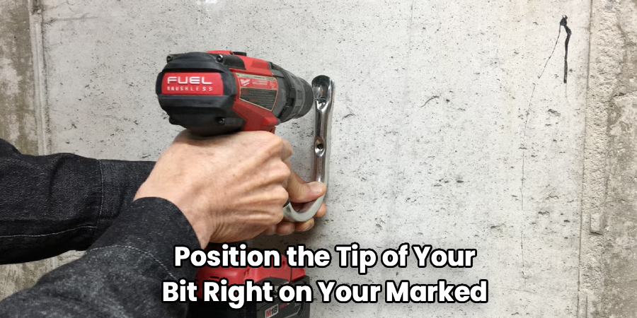 Position the Tip of Your
Bit Right on Your Marked