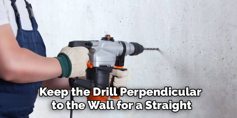 Keep the Drill Perpendicular
 to the Wall for a Straight