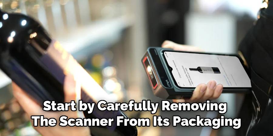 Start by Carefully Removing
The Scanner From Its Packaging